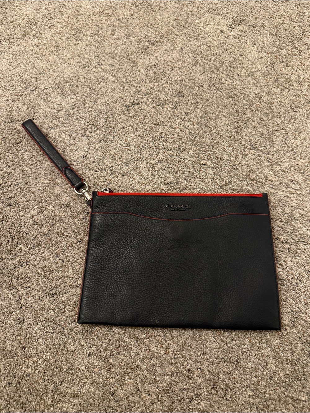 Coach Charter Pouch Navy detachable wrist strap and red zipper trim